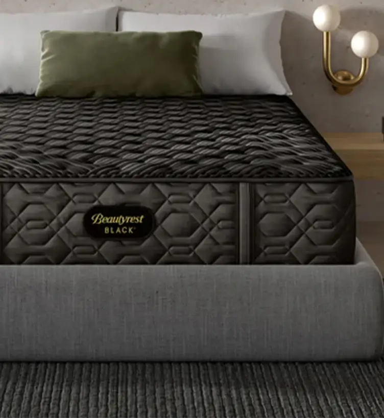 A modern premium mattress displayed on a bed